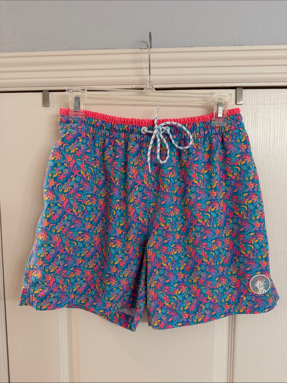 chubbies Blue Floral Swim Trunks with Pink Waistband